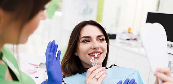 young woman getting veneers in Heber City